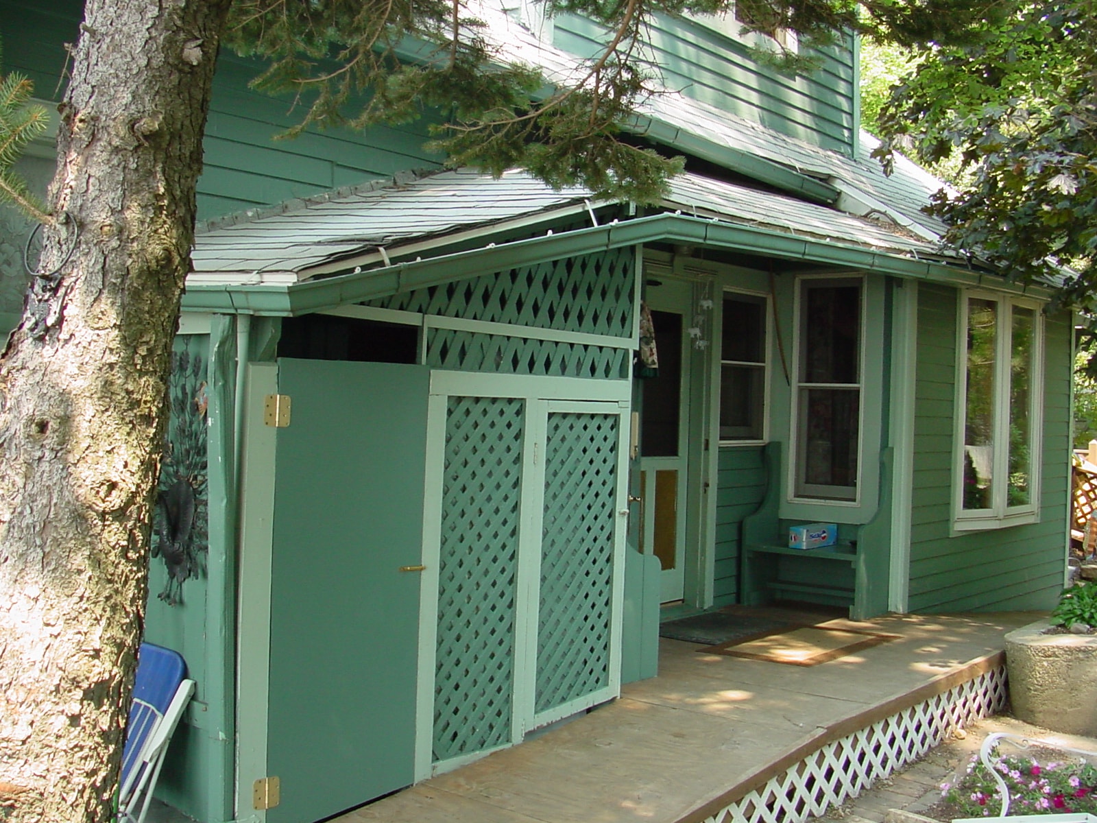 Cottage surrounded by trees